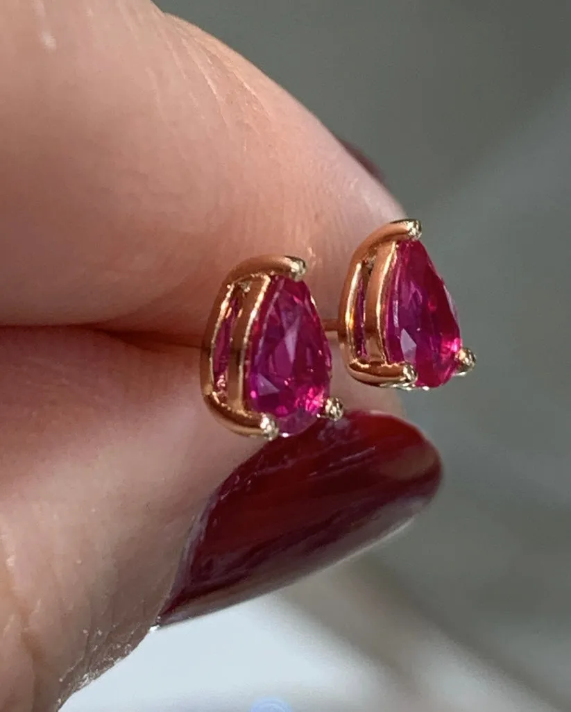 0.86ct tw Ladies Pear Shape Ruby Stud Earrings