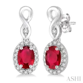 5x3 MM Oval Cut Ruby and 1/6 Ctw Round Cut Diamond Earrings in 10K White Gold