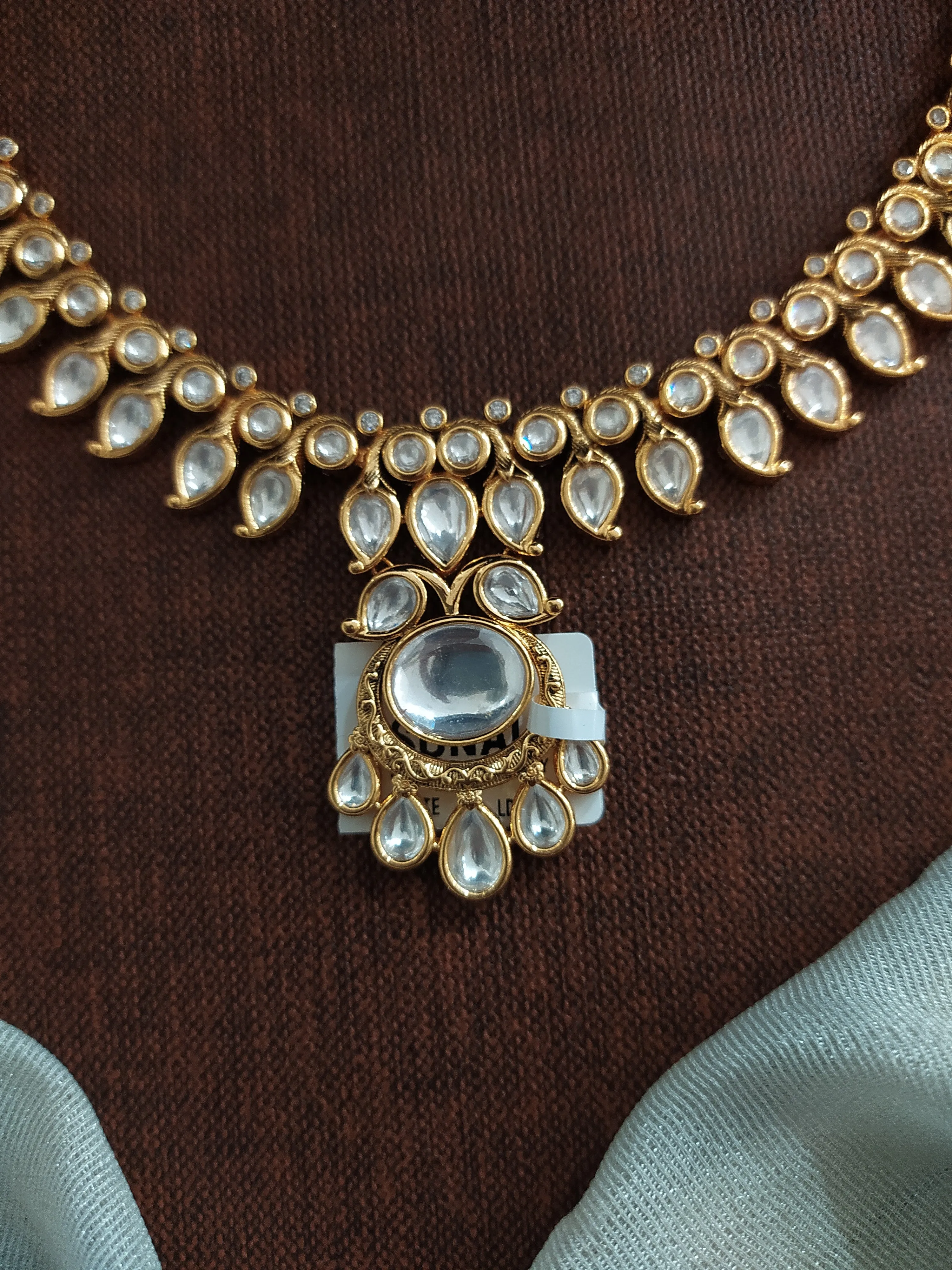 Dazzling Center Pendant Polki Kundan Necklace Set