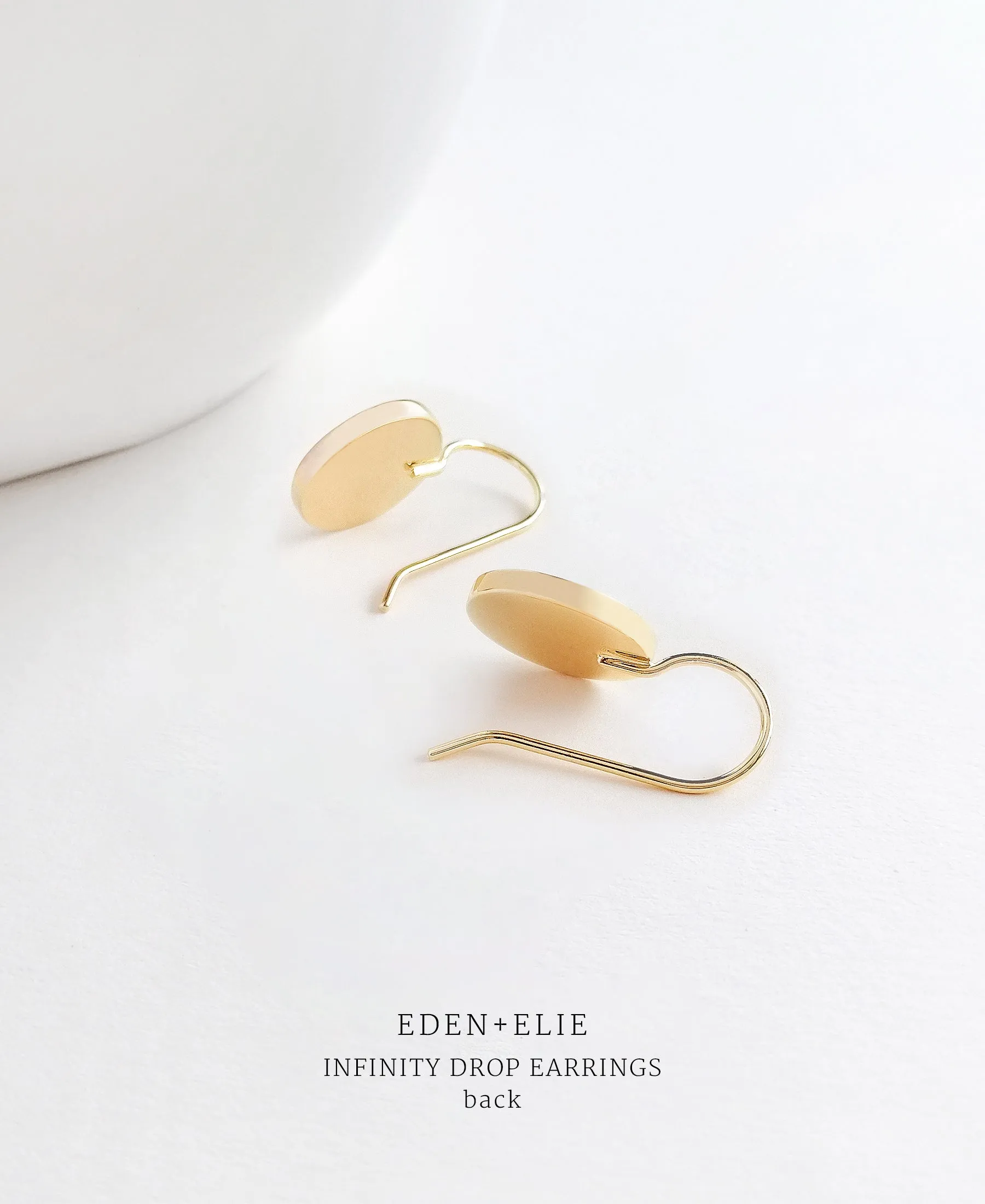 EDEN   ELIE Infinity drop earrings - lagoon