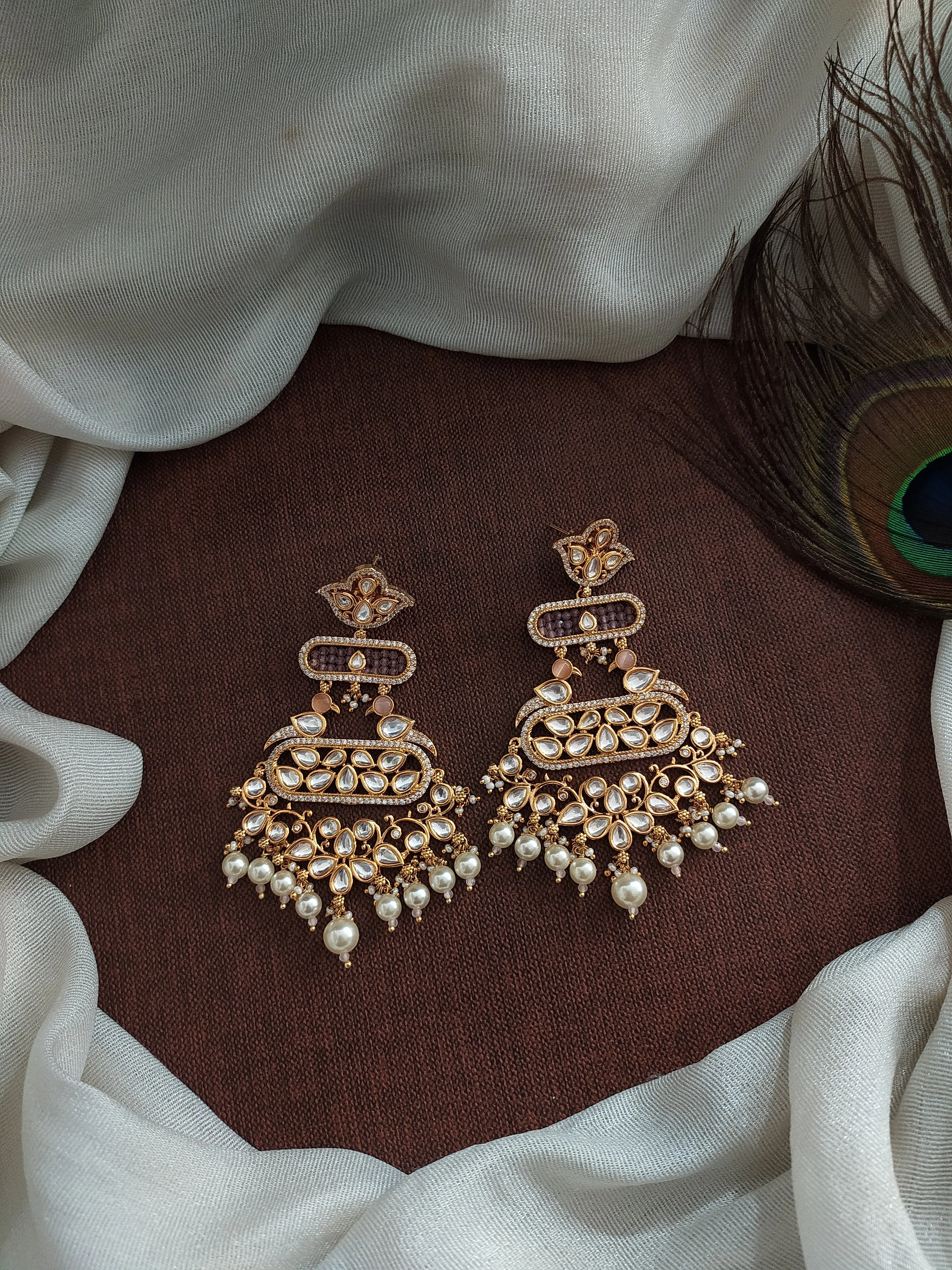 Elevate Your Look with Our Stunning Kundan Dangling Earrings