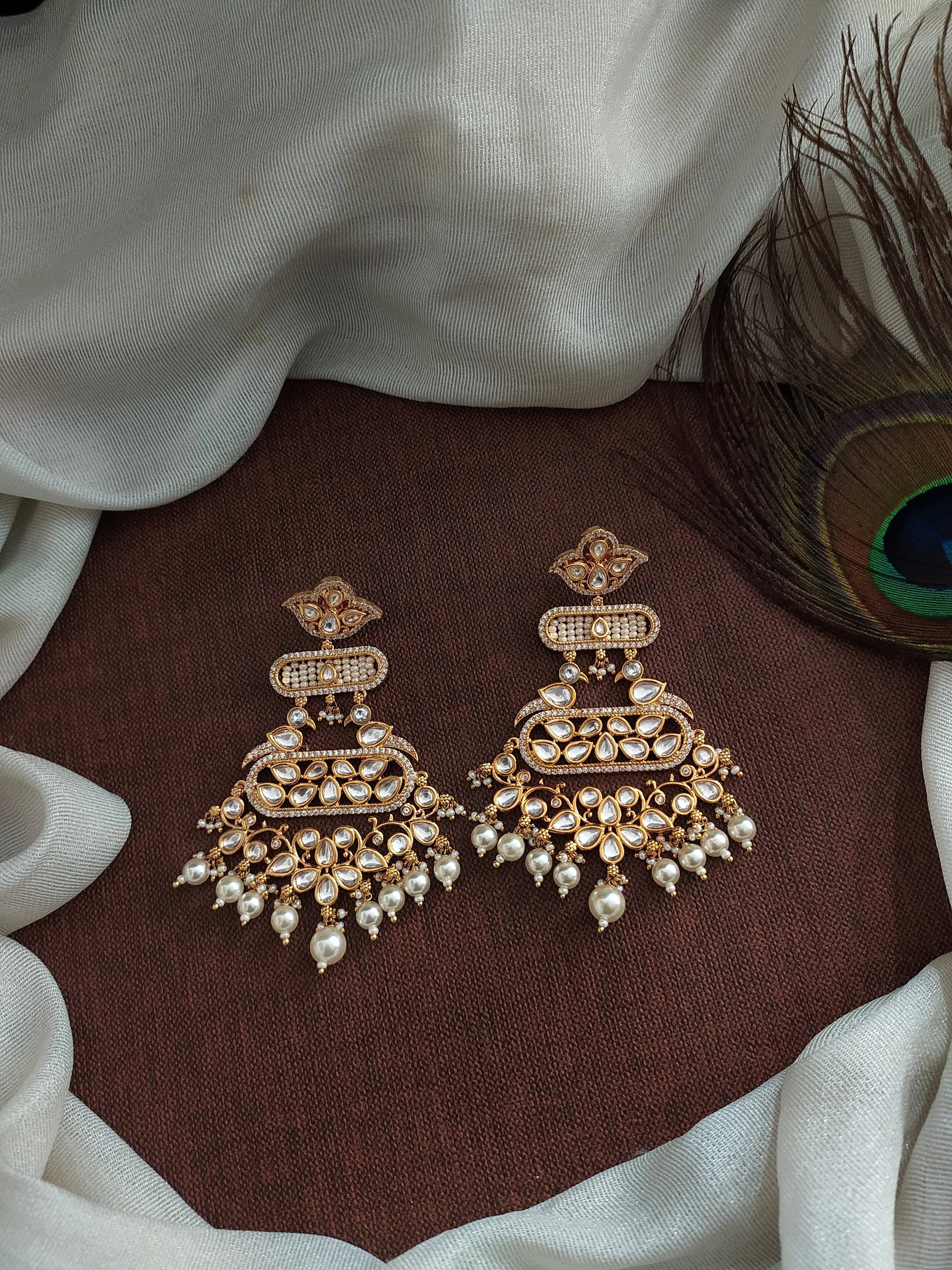 Elevate Your Look with Our Stunning Kundan Dangling Earrings