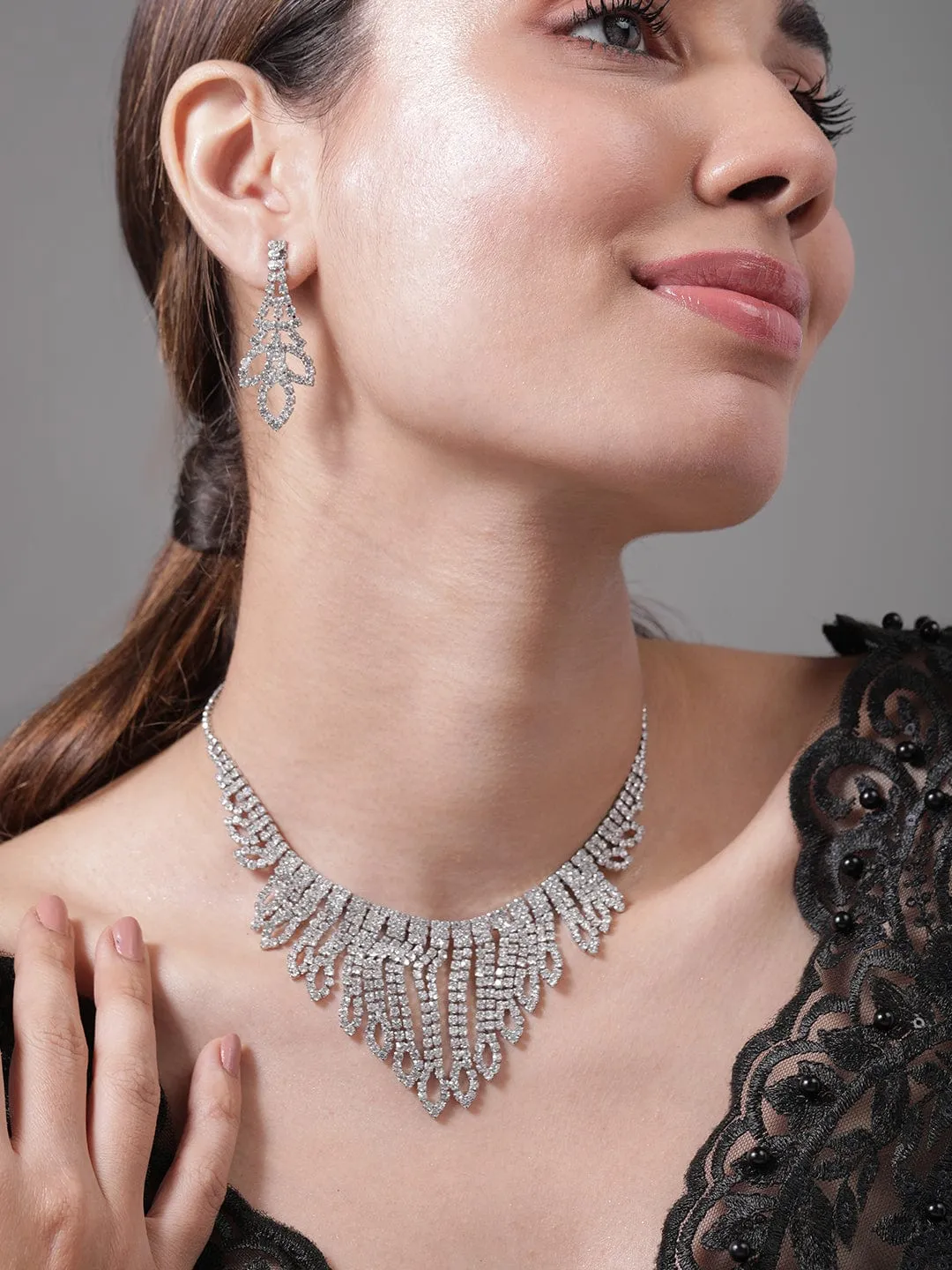 Rubans Rhodium Plated AD & Cubic Zirconia Studded Statement Necklace Set with Droplet Design