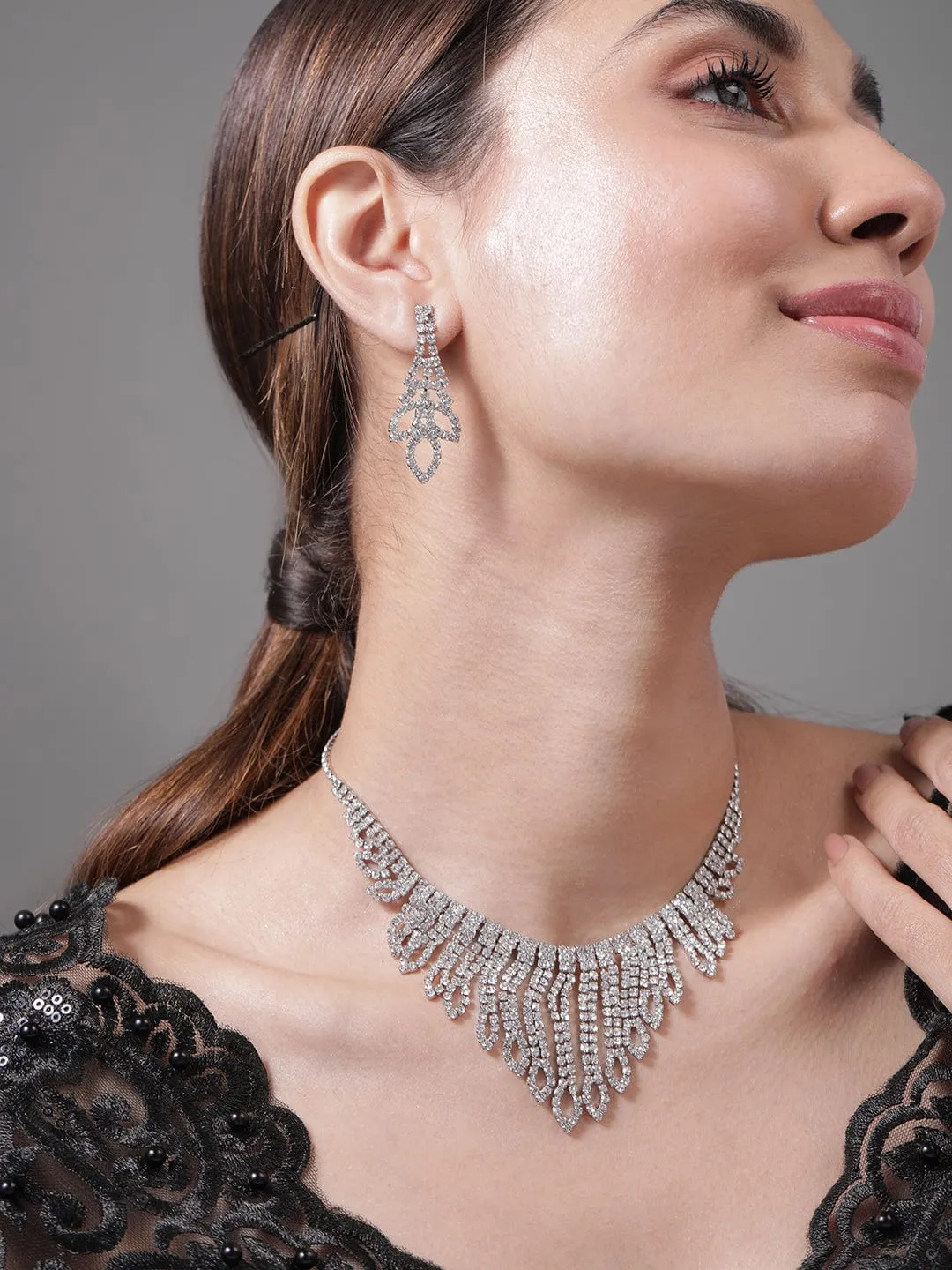 Rubans Rhodium Plated AD & Cubic Zirconia Studded Statement Necklace Set with Droplet Design